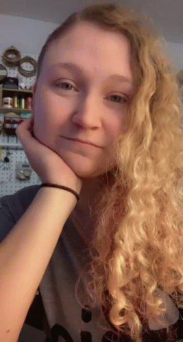 Skeptical Curly Blonde Speculating GIF