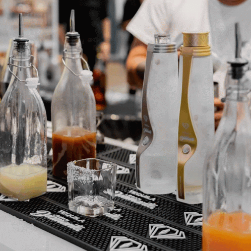 Skilled Mixing Up Liquor Shots GIF