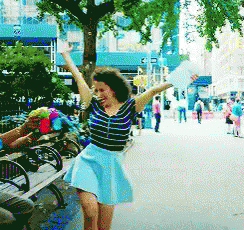 Happy Girl Skipping GIF