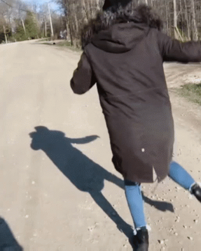 Woman Happy Skipping Shadow GIF