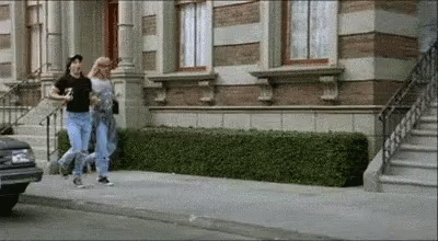 Happy Ladies Holding Hands Skipping GIF