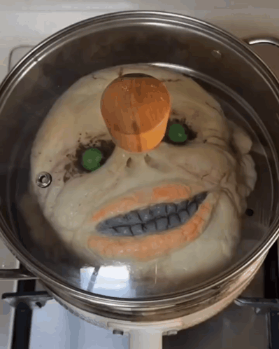 Skull-Shaped Food Pot With Wooden Lid GIF