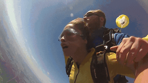 Skydiving Woman Caught Shoe GIF