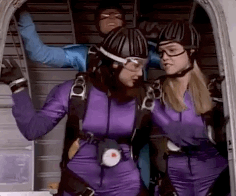 Skydiving Women Pushing Each Other GIF