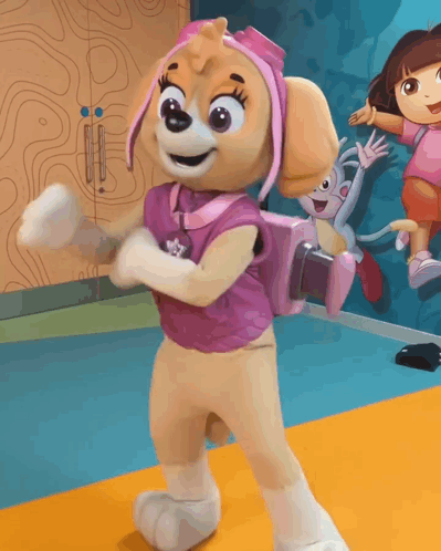 Skye From Paw Patrol Dancing In Front Of Dora Mural GIF