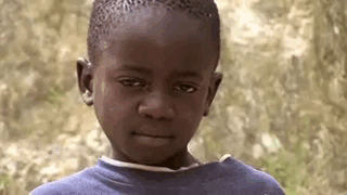 Slapped African Kid GIF