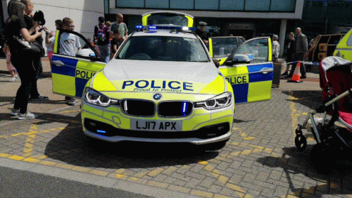 Sleek London Police Car Roaming GIF
