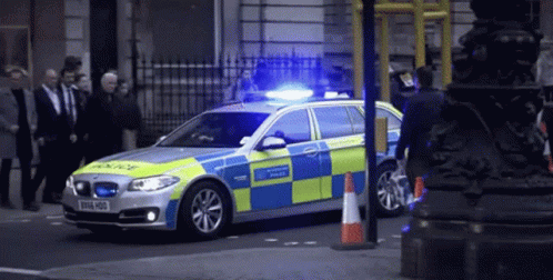 Sleek London Police Car Roaming GIF