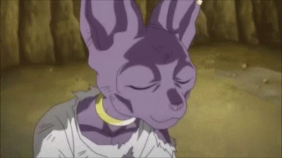 Sleepy Beerus Licking And Cleaning His Face GIF