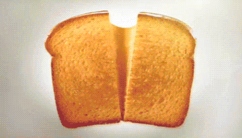 Slice of Bread Cut in Half With Hole in Middle