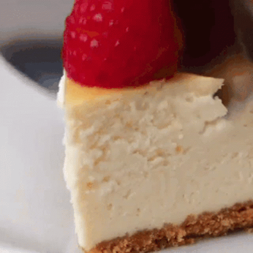 Slice of Cheesecake with Raspberry