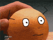 Slicing Orange Fruit Doodle Eyes GIF