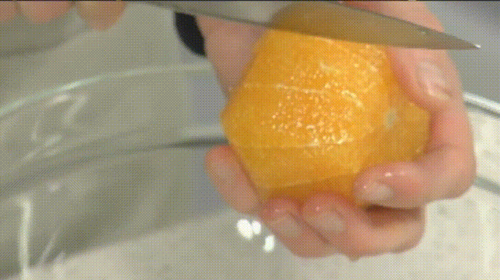 Slicing Orange Pieces GIF