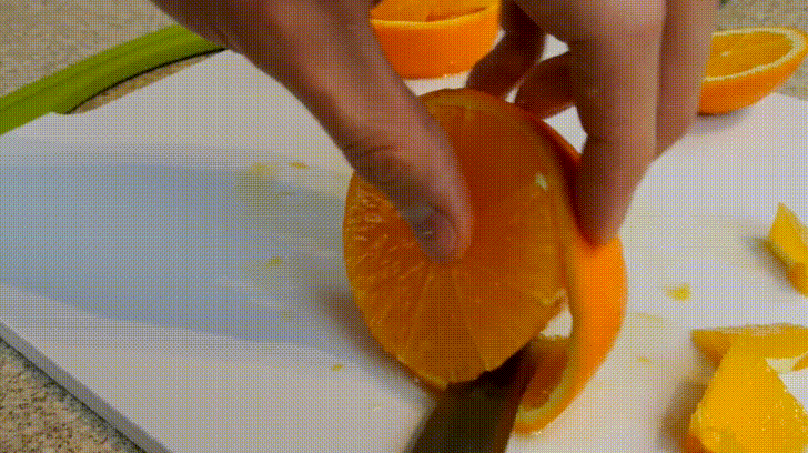 Slicing Orange With A Knife GIF
