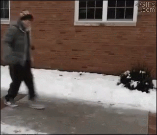 Man Slipping On Ice Hilariously GIF