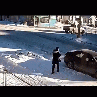 Man's Winter Struggle Of Slipping On Ice GIF