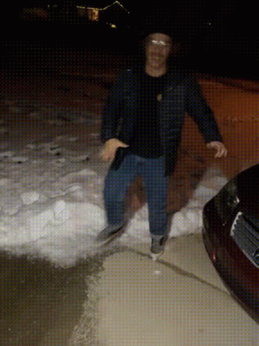 Man's Comical Struggle With Slipping On Ice GIF