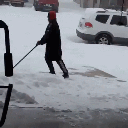 Man In Comical Slipping On Ice Moment GIF