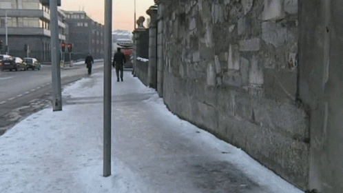 Slipping On Icey Sidewalk GIF