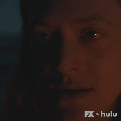 Slow Blink Close Up Face In Dark Light GIF