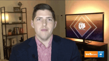 Slow Blink Man In Black Suit GIF