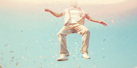 Slow Motion Confetti Jump GIF