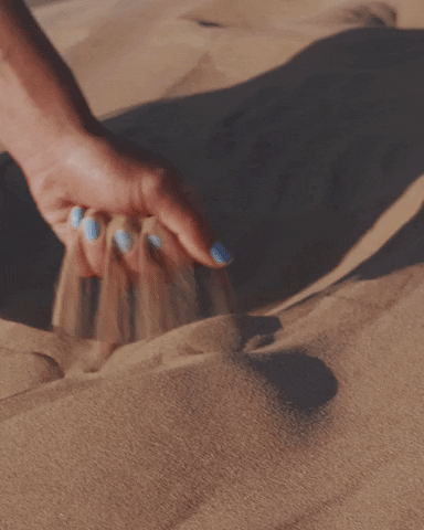 Slow Motion Sand Escaping GIF