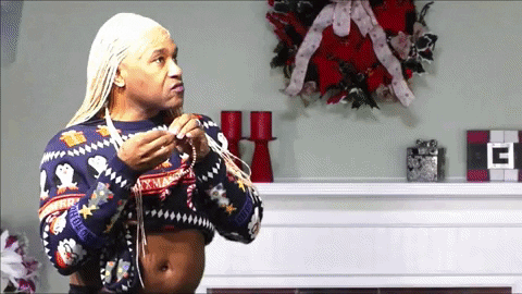 Sly Smile Merry Christmas Meme GIF