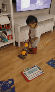 Small And Cute Baby Cleaning GIF