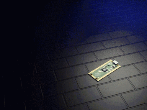 Small Electronic Device On Black Floor GIF