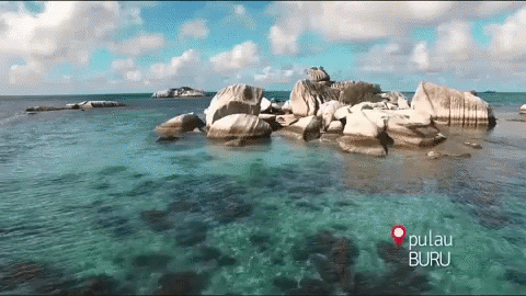 Small Island in Ocean with Pulau Buru