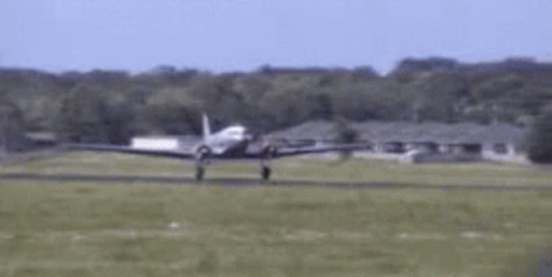 Small Plane Taking Off From Grassy Runway