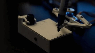 Small Robot Writing Time GIF