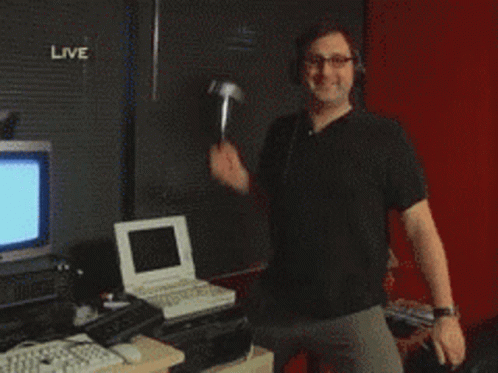 Smashing Computer Fixing Old Computer Meme GIF