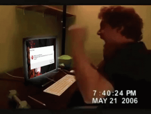 Smashing Computer Guy Punching Screen GIF