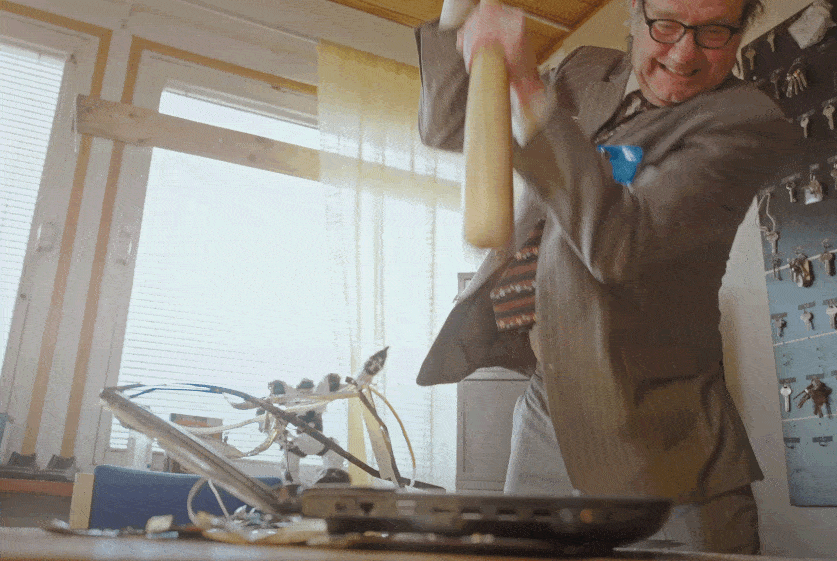 Infuriated Man Smashing Computer With Bat GIF