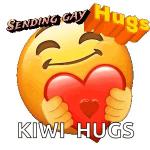Smiley Face Holding Red Heart Sending Gay Hugs