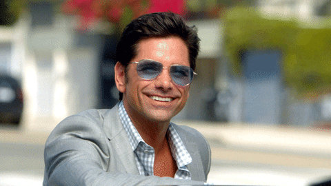 Smiley John Stamos GIF