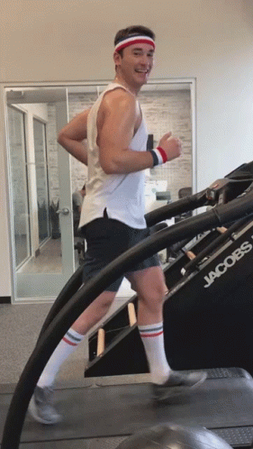 Smiling And Running On Treadmill GIF