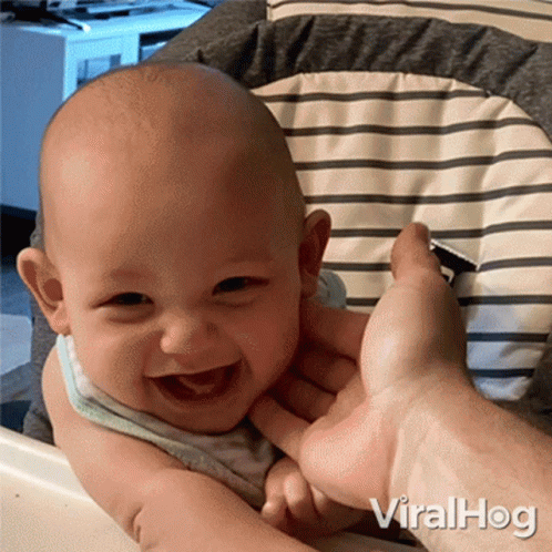 Smiling Baby Held By Person Viralhog GIF