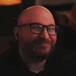 Smiling Bald Man With Beard And Glasses GIF