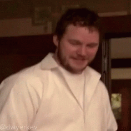 Smiling Bearded Man In White Shirt And Jacket GIF