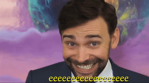 Smiling Bearded Man on Purple Background Saying Eeeee