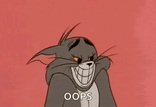 Smiling Cartoon Cat Saying Oops