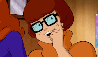 Smiling Cartoon Character With Glasses GIF