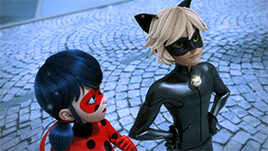 Smiling Chat Noir With Ladybug On Snowfall GIF