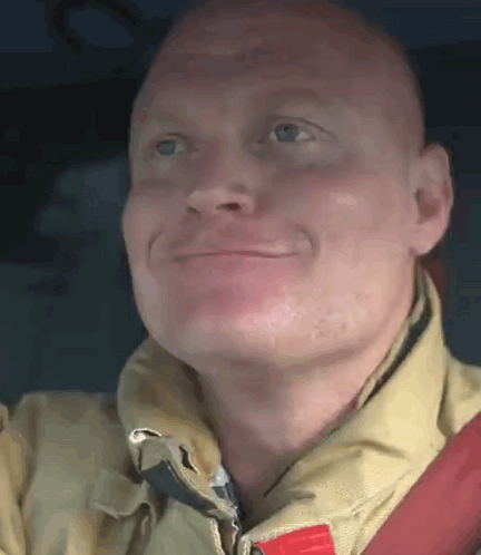Smiling Fireman Looking Up
