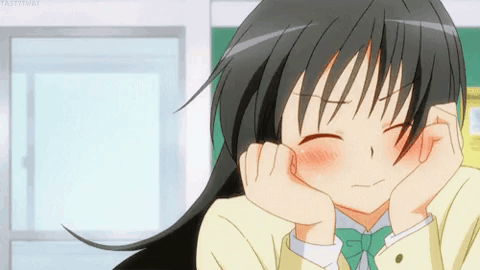 Smiling Girl With Long Black Hair And Green Bow Tie GIF