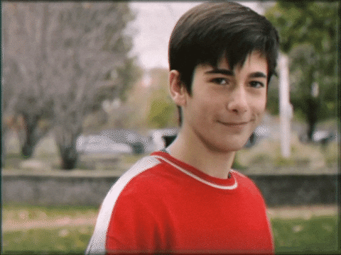 Smiling Kid Thumbs Up GIF