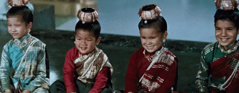 Smiling Kids In Traditional Wear GIF
